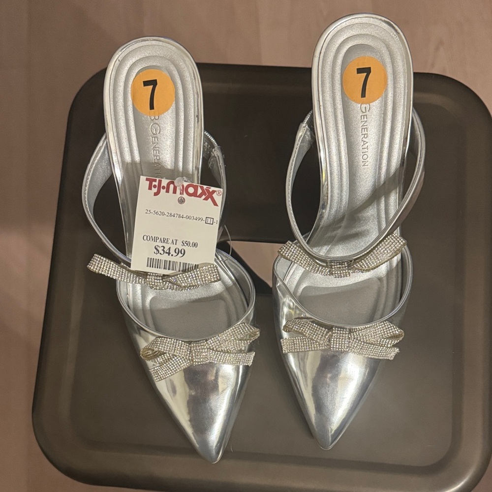 BCBGeneration Silver Pointed Slingback Heels with Crystal Bow Accents